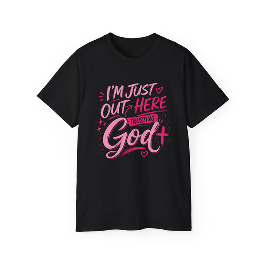 Christian Graphic Tee — "I'm Just Out Here Trusting God" Pink Script